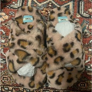 TOMS Cheetah print slippers.